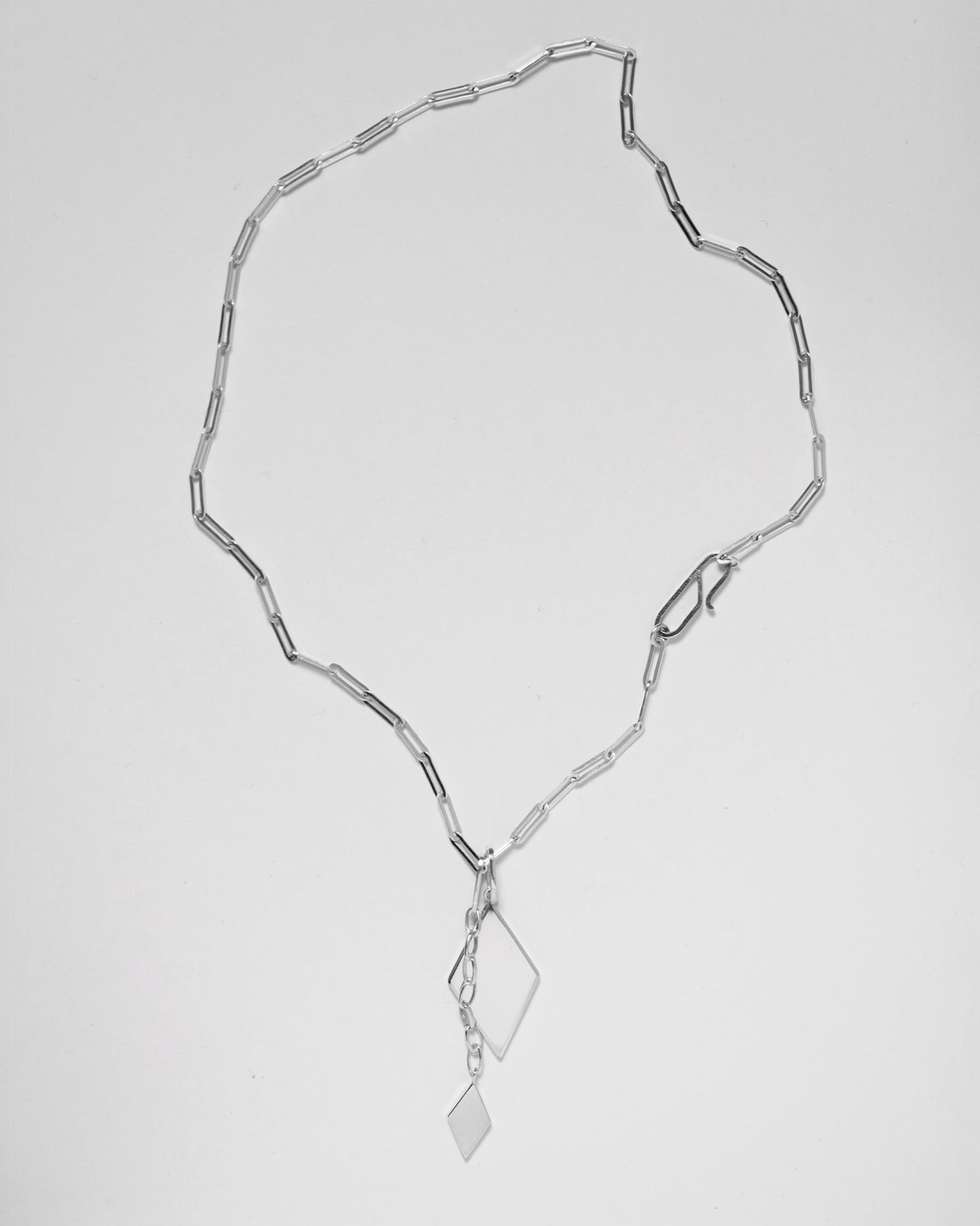 Double rhomb pendant necklace.