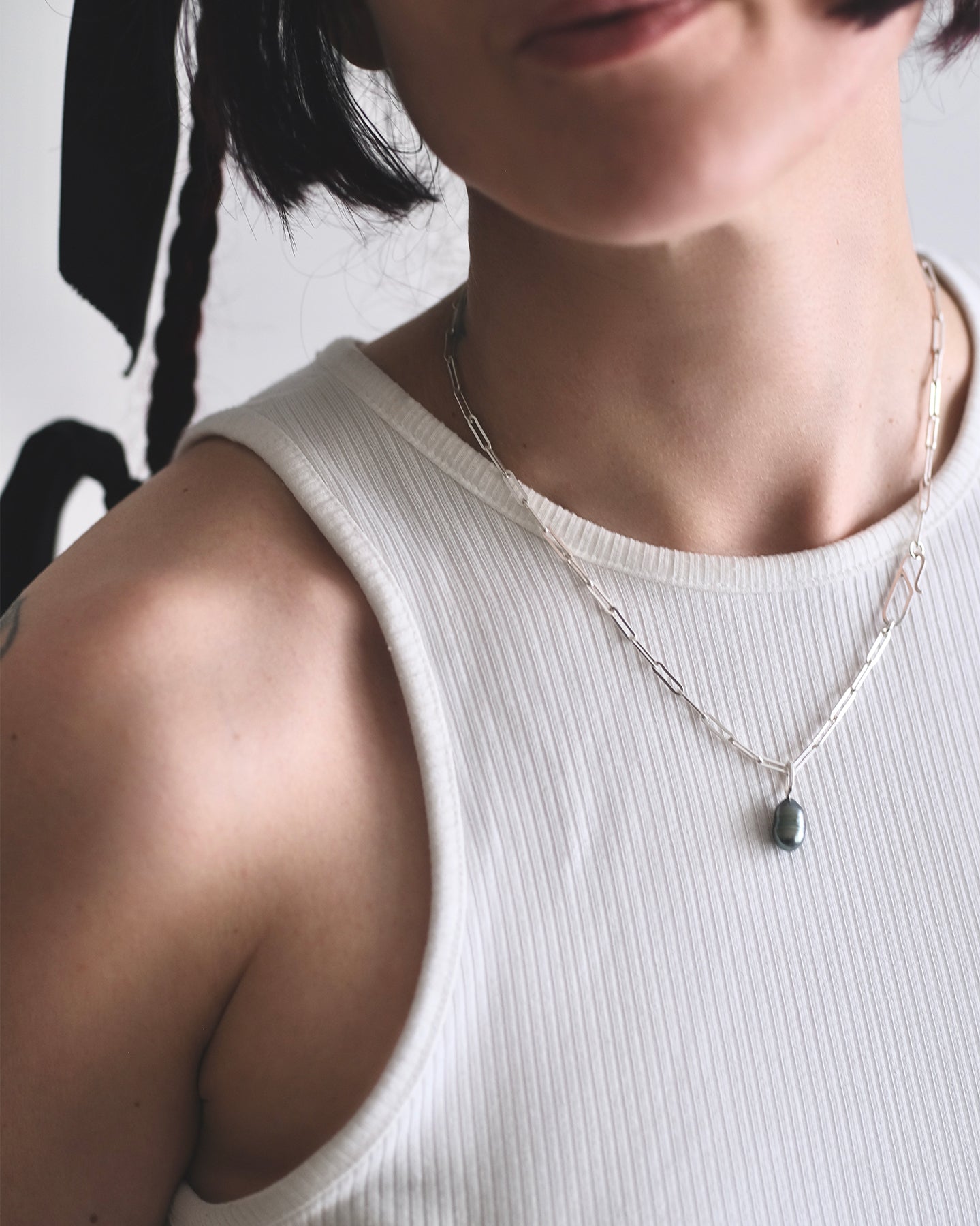 Tahiti Keshi pearl pendant on sterling silver paperclip chain.