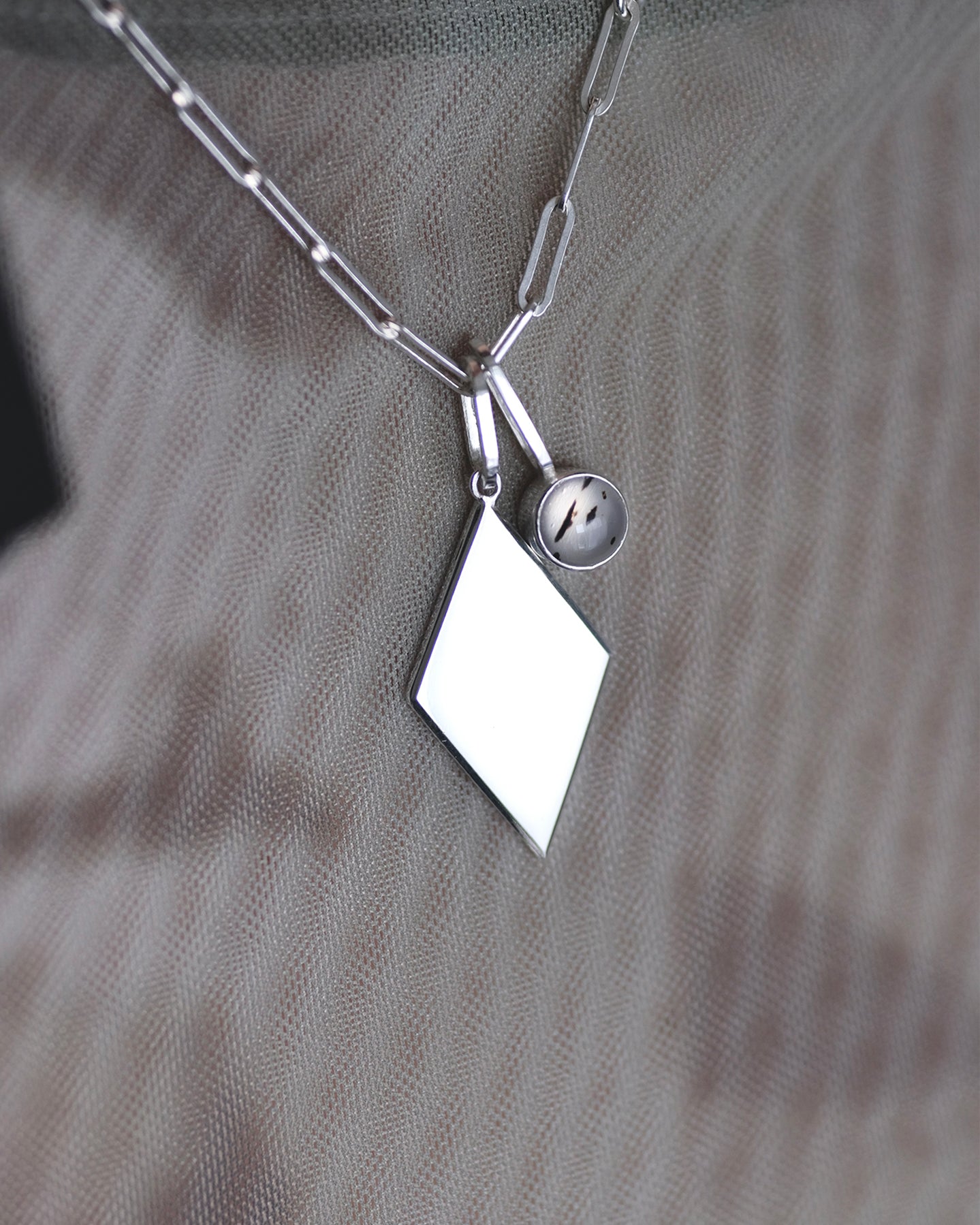 Large rhomb pendant and a Montana agate pendant in a flat paperclip chain.