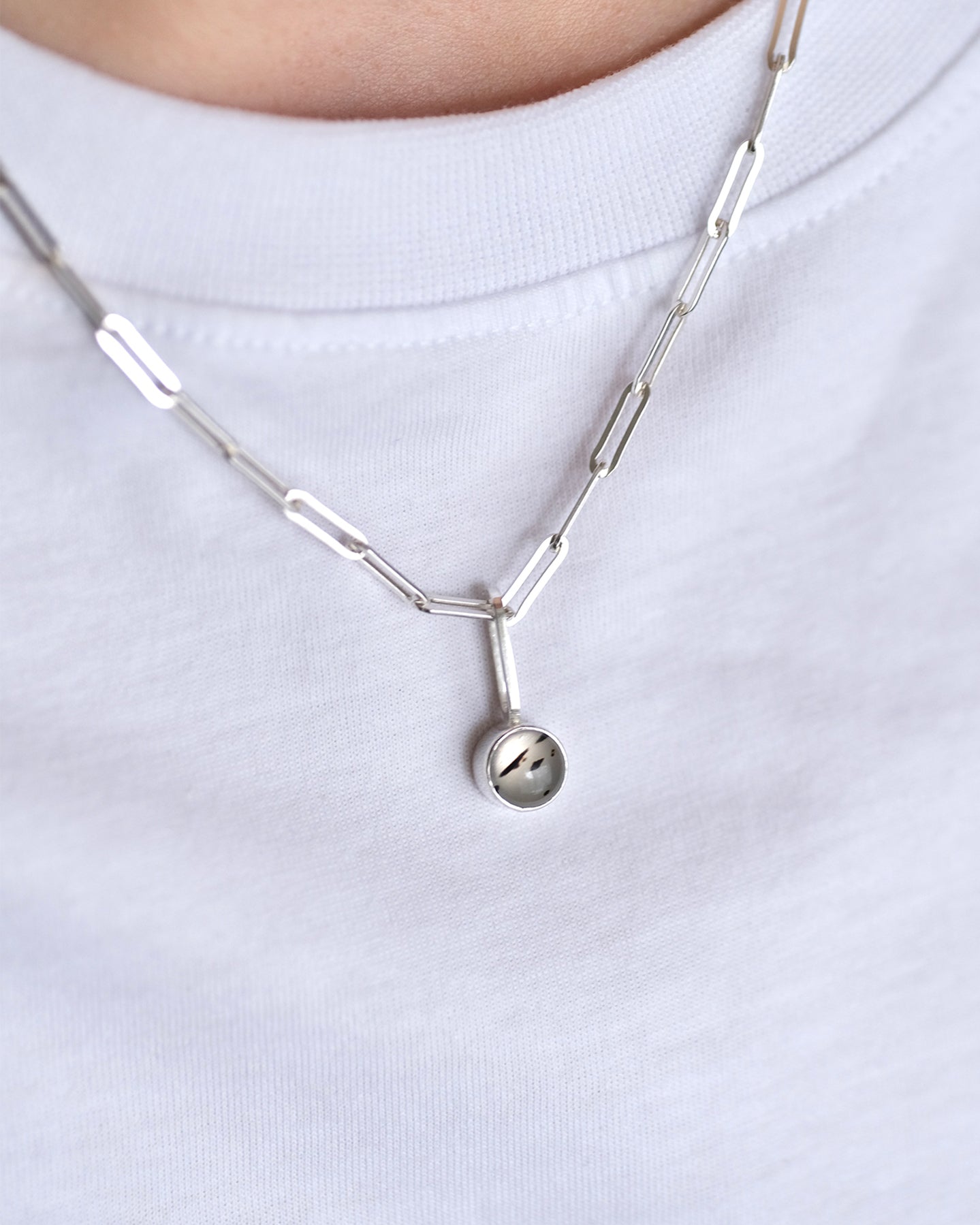 Montana agate pendant in a bezel setting.
