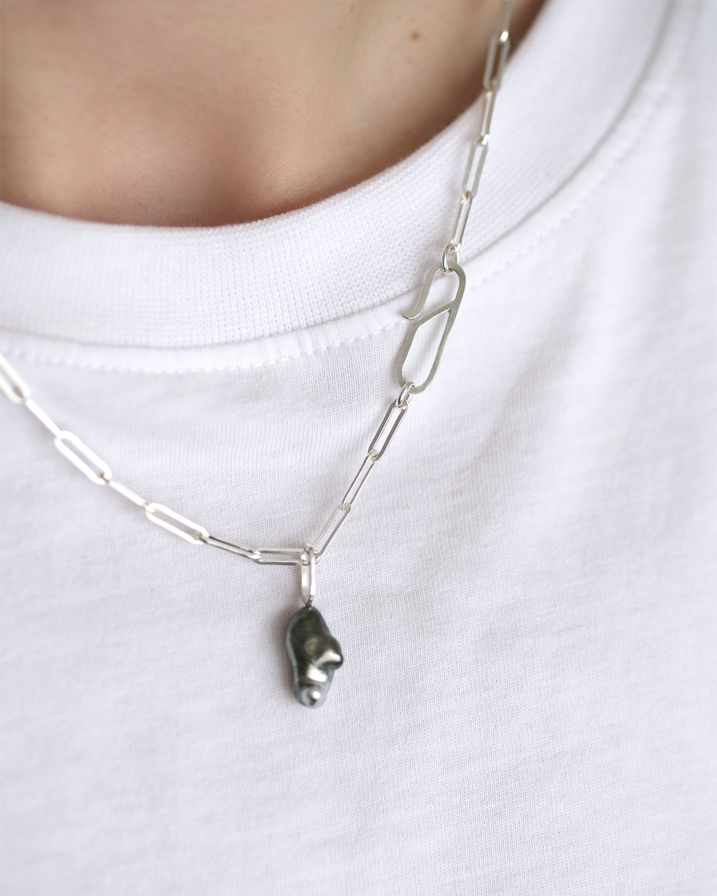 Keshi pearl pendant on silver paper clip chain.